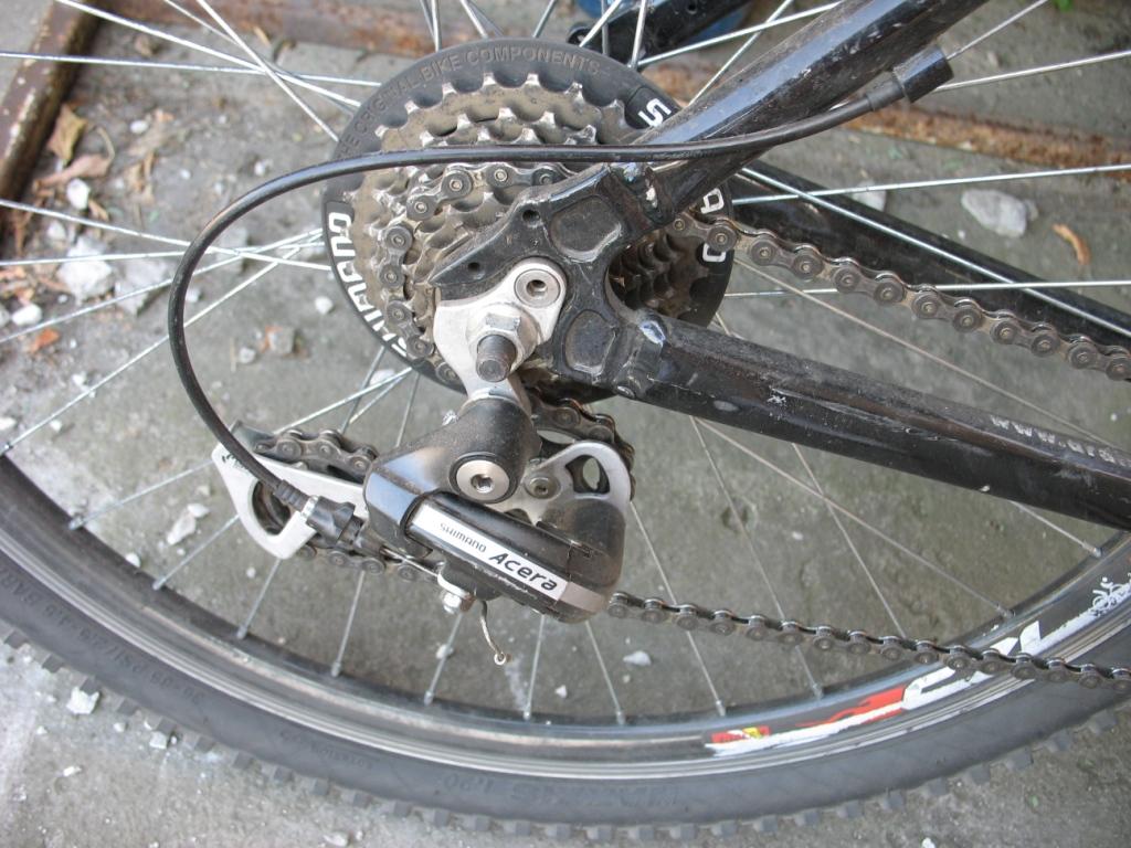 Как поставить цепь на скоростной велосипед заднее колесо фото