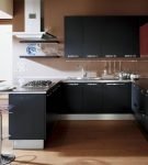 Красно-чёрная мебель на кухне модерн